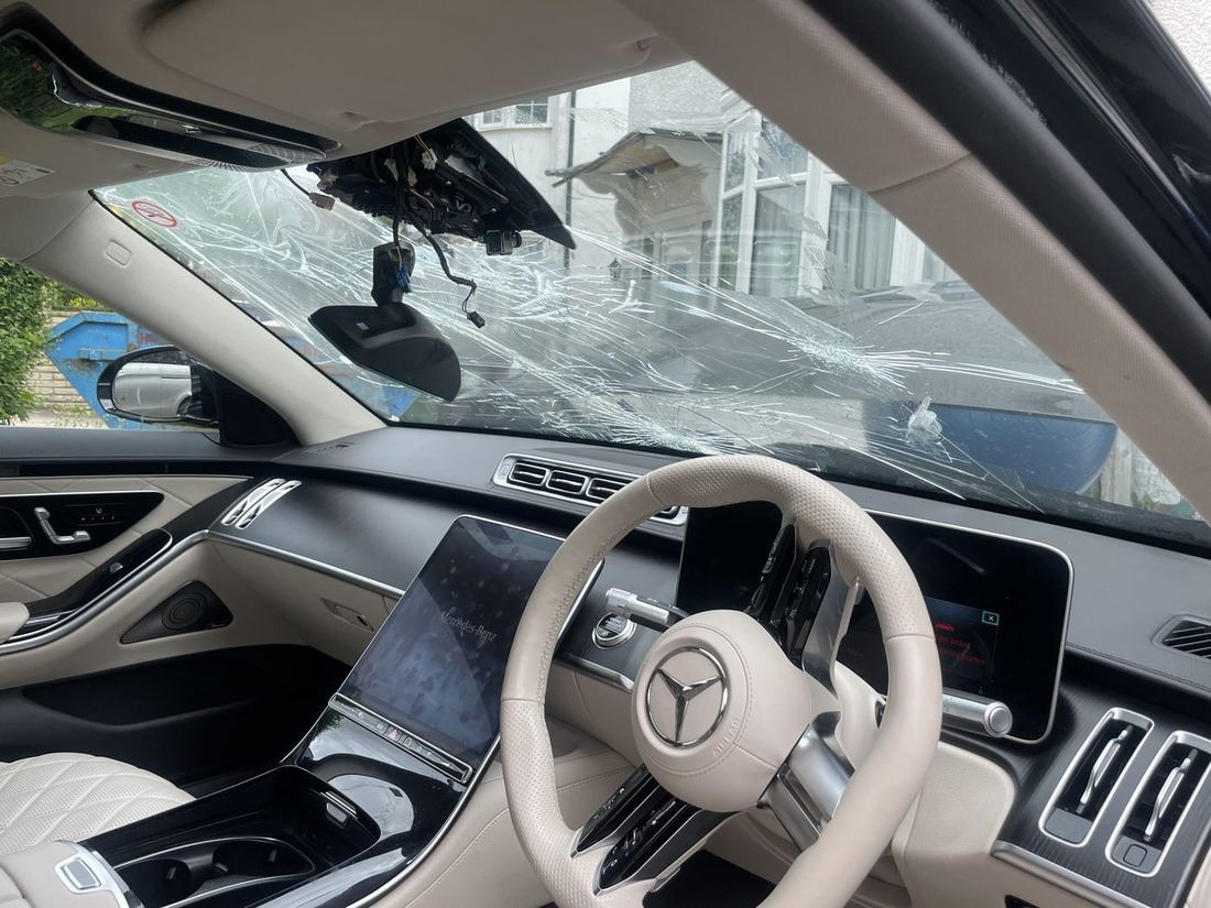 Mercedes S-Class windscreen completely shattered with cracks spreading across the glass